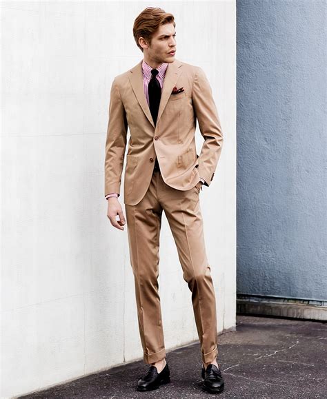 black suit with tan tie outfit.